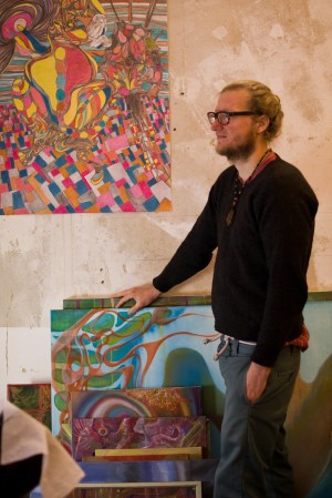 Petr Knösel with his paintings